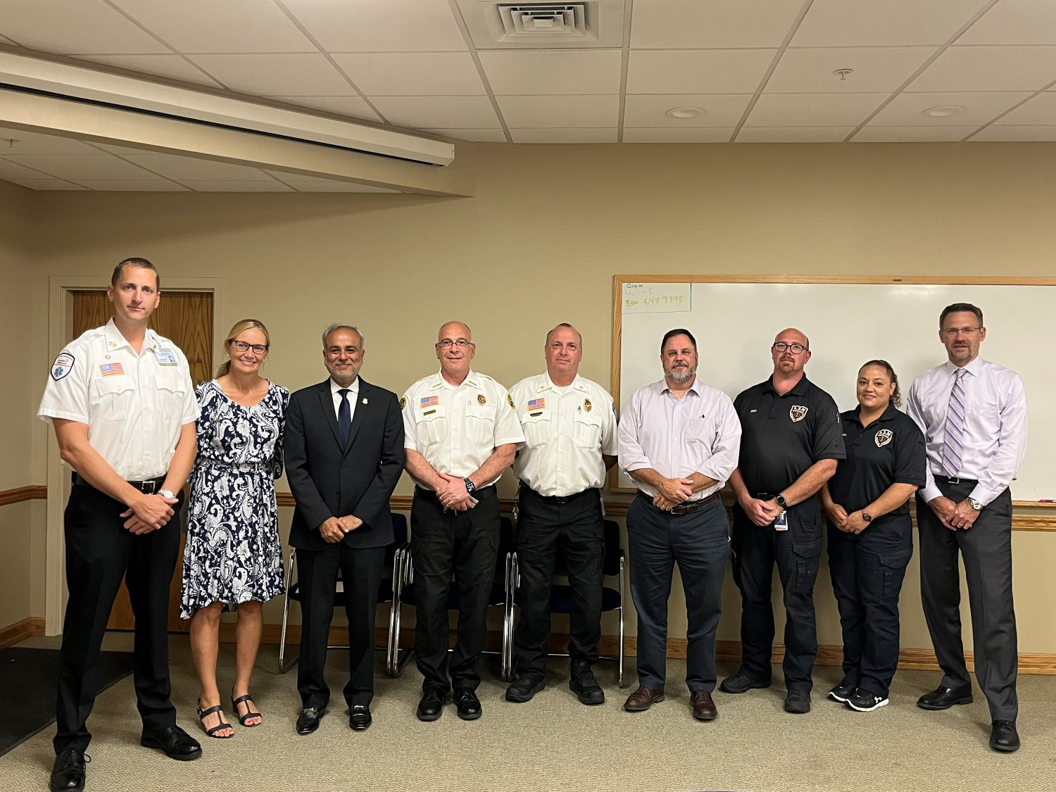 Dr. Saud Anwar with a group of local first responders