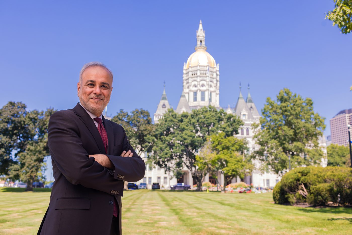 Dr. Saud Anwar in front of the Connecticut State Capitol