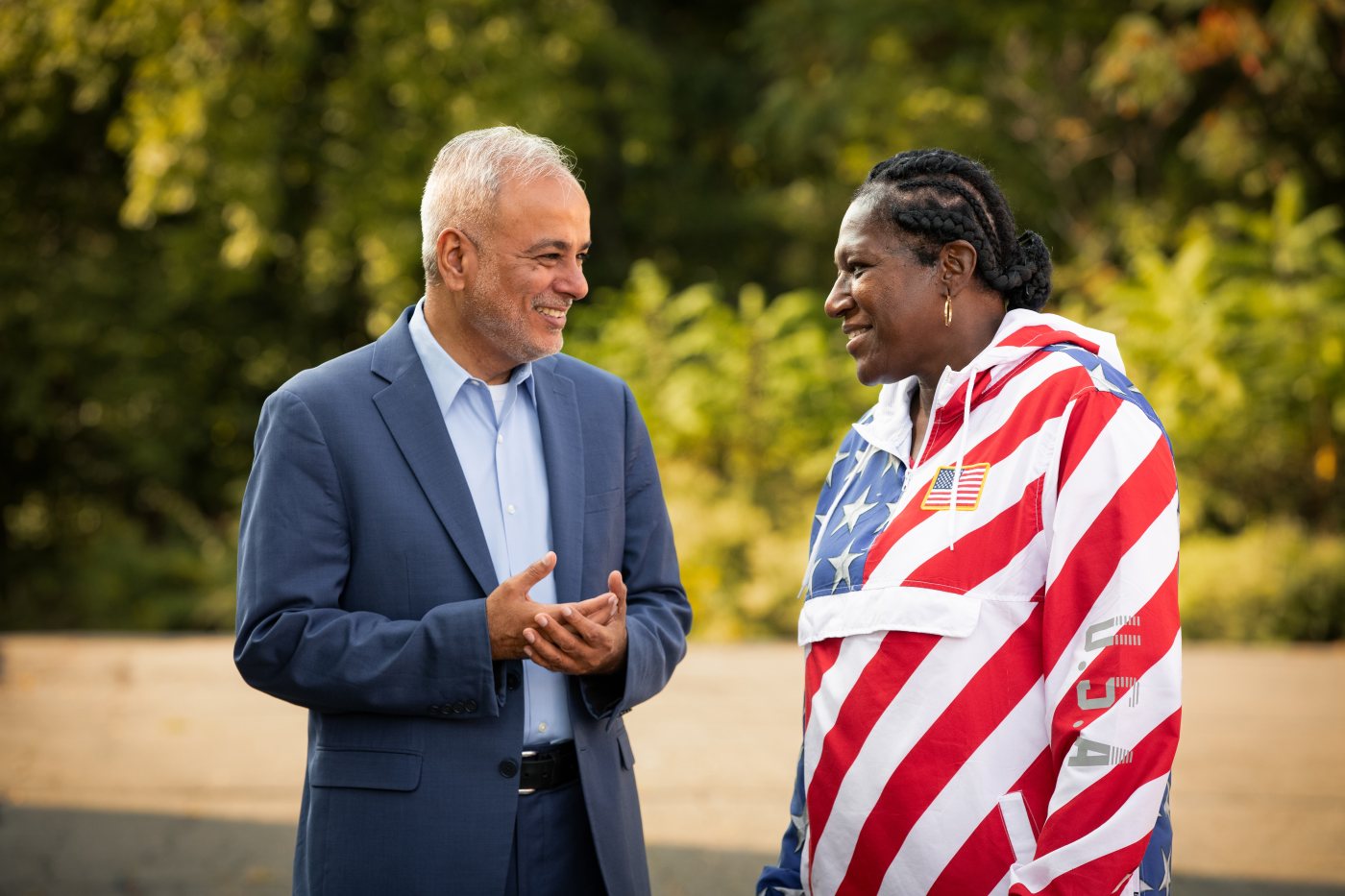 Senator Anwar standing with a veteran